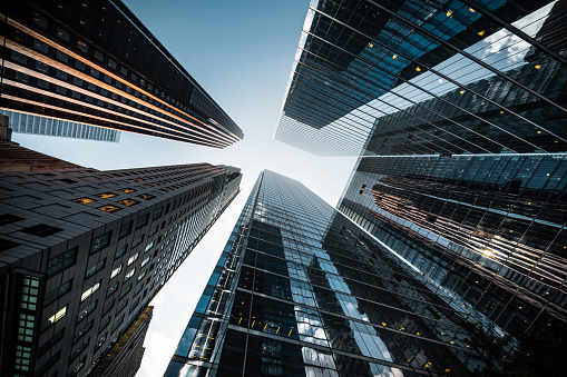 business-and-finance-looking-up-at-high-rise-office-buildings-in-the-financial-district-of-a.jpg